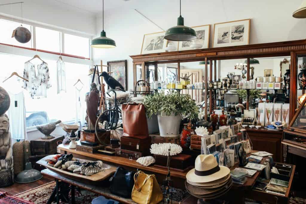 A shop's interior with a variety of items, including antique objects.