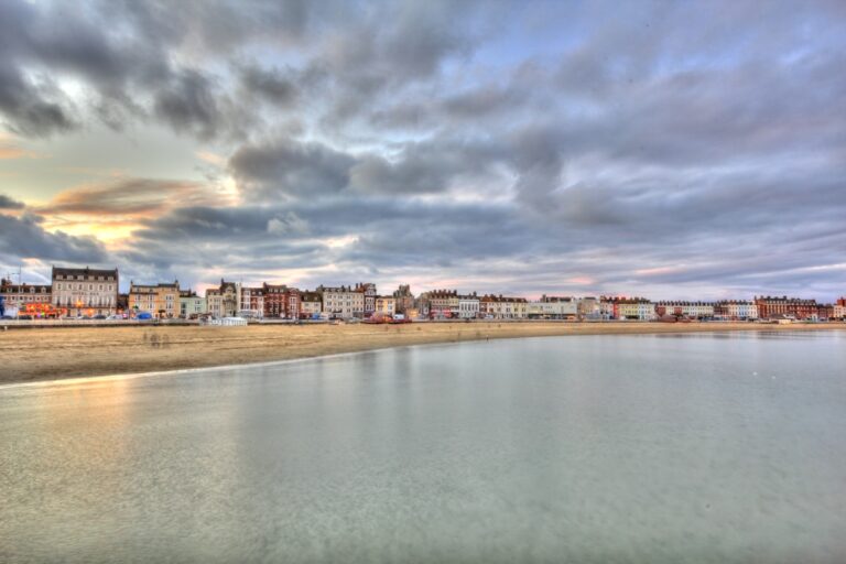 Weymouth Beach at sunset in the concept of parks and green spaces in Weymouth.