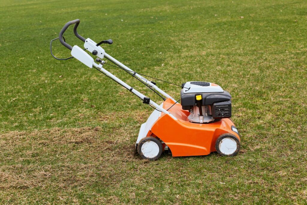 A grass cutter on the lawn